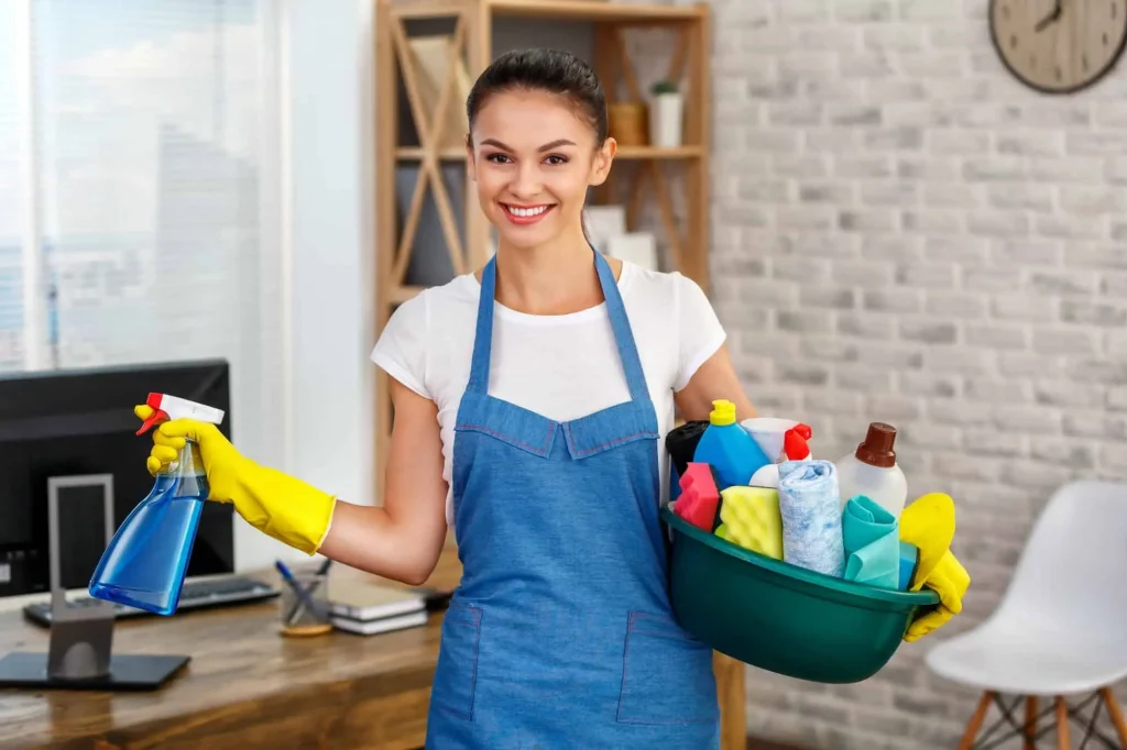 Friendly professional cleaner with supplies — Cary Cleaning Pros Triangle NC